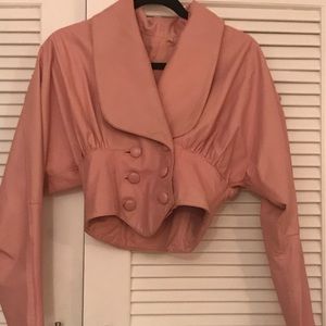 Pink leather crop jacket.